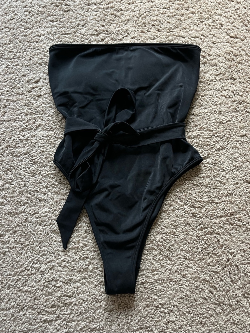 Black strapless one piece bathing suit